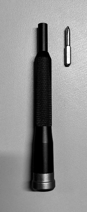 A black hammer with a black handle

Description automatically generated