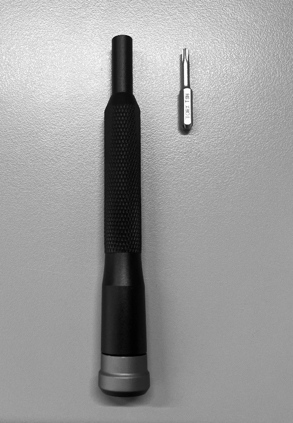 A screwdriver and a bit

Description automatically generated